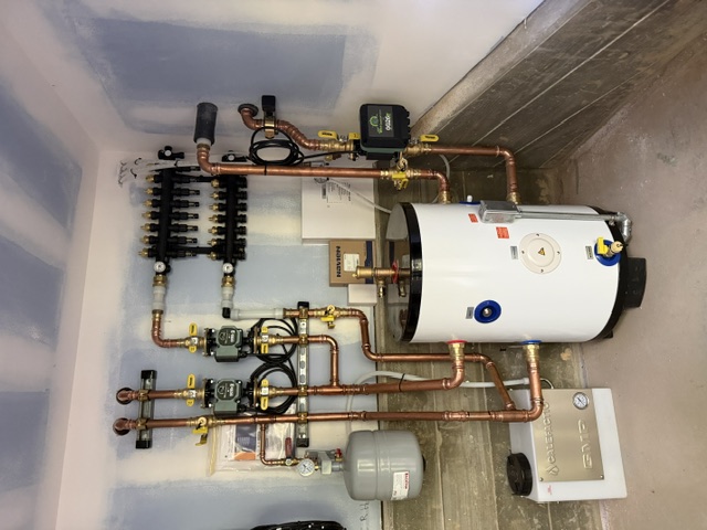 Mechanical room with manifold and indirect tank