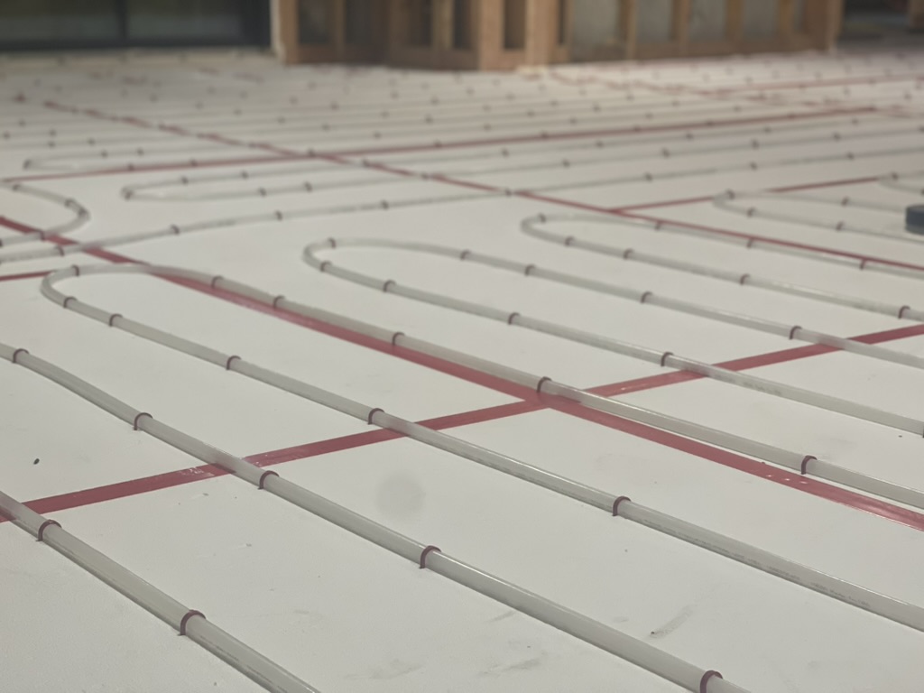 Radiant PEX in gypsum pour with red guides
