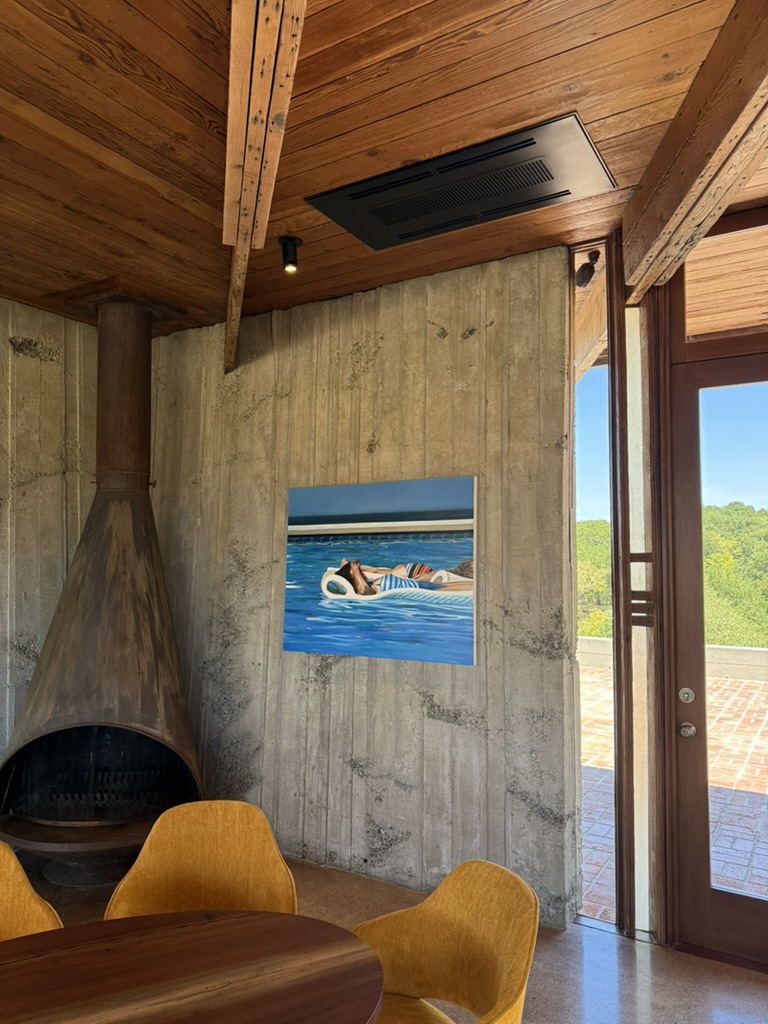 Ceiling fan coil unit in a living room with view