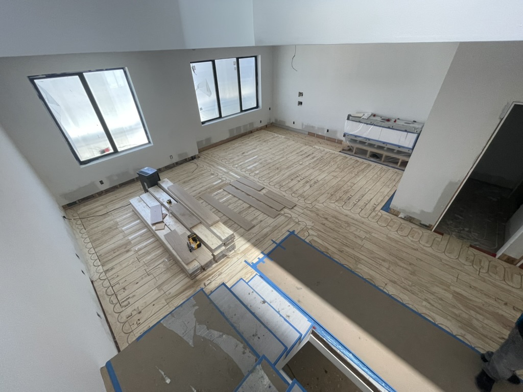 Radiant heating loops across a large great room floor