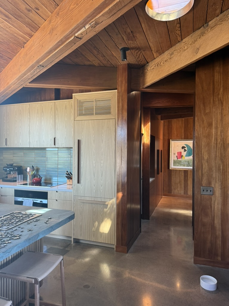 Concealed fan coil above kitchen cabinetry